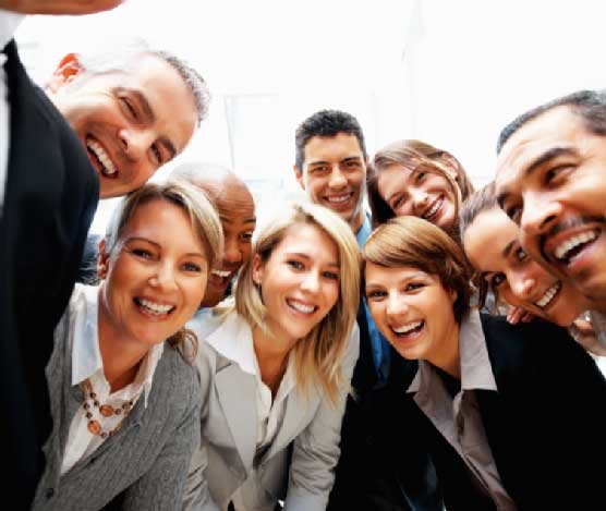Group of colleagues clicking selfie together