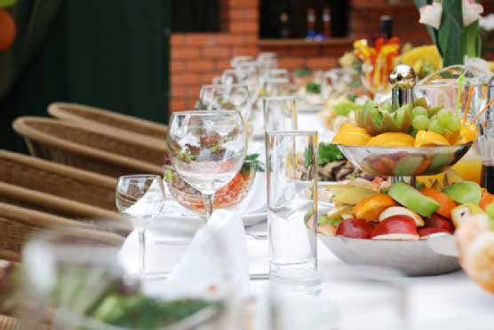 Food arranged on dinning table