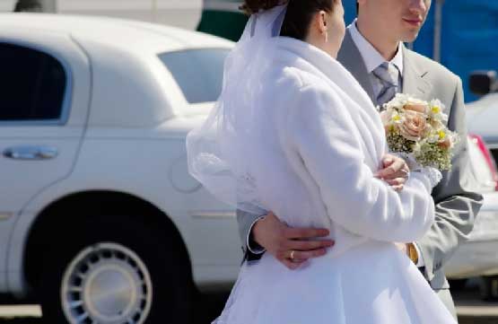 wedding couple clicking picture together