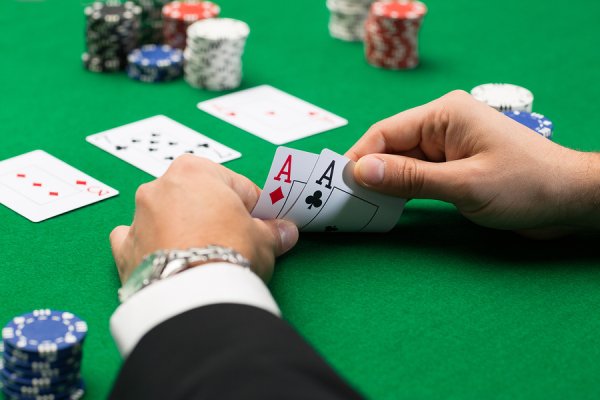 Man playing cards in casino